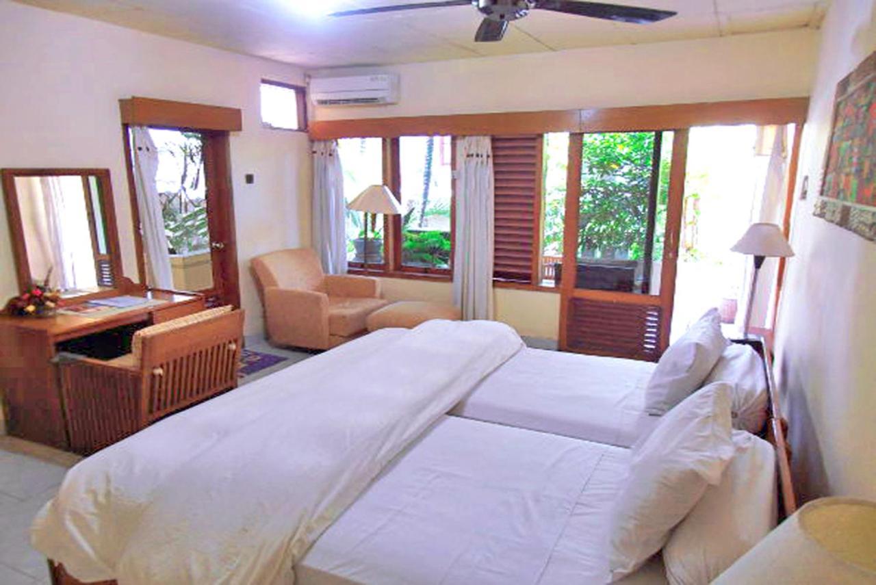 Nakula Familiar Inn Denpasar Extérieur photo